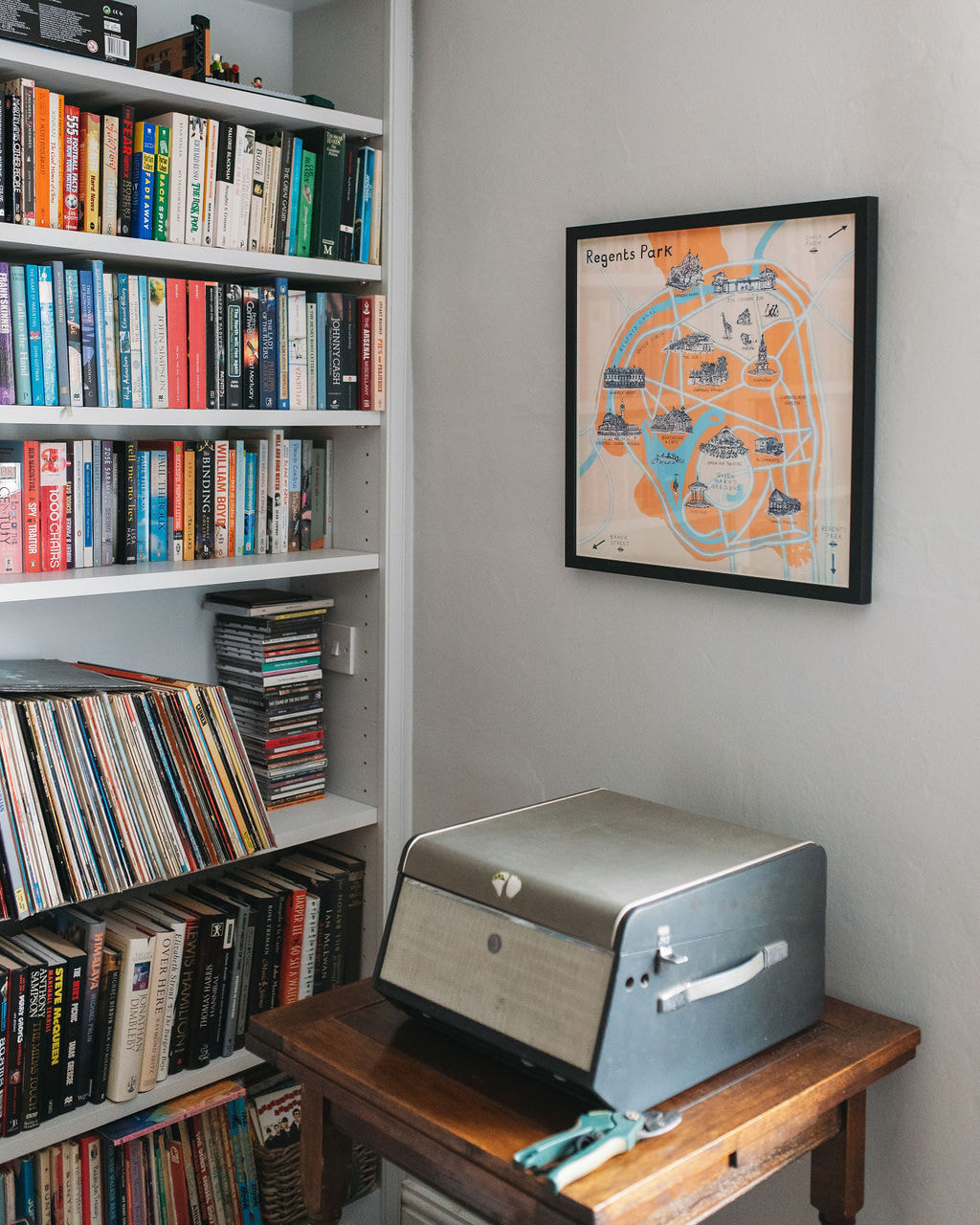 Room interior with bookcase and vintage record player